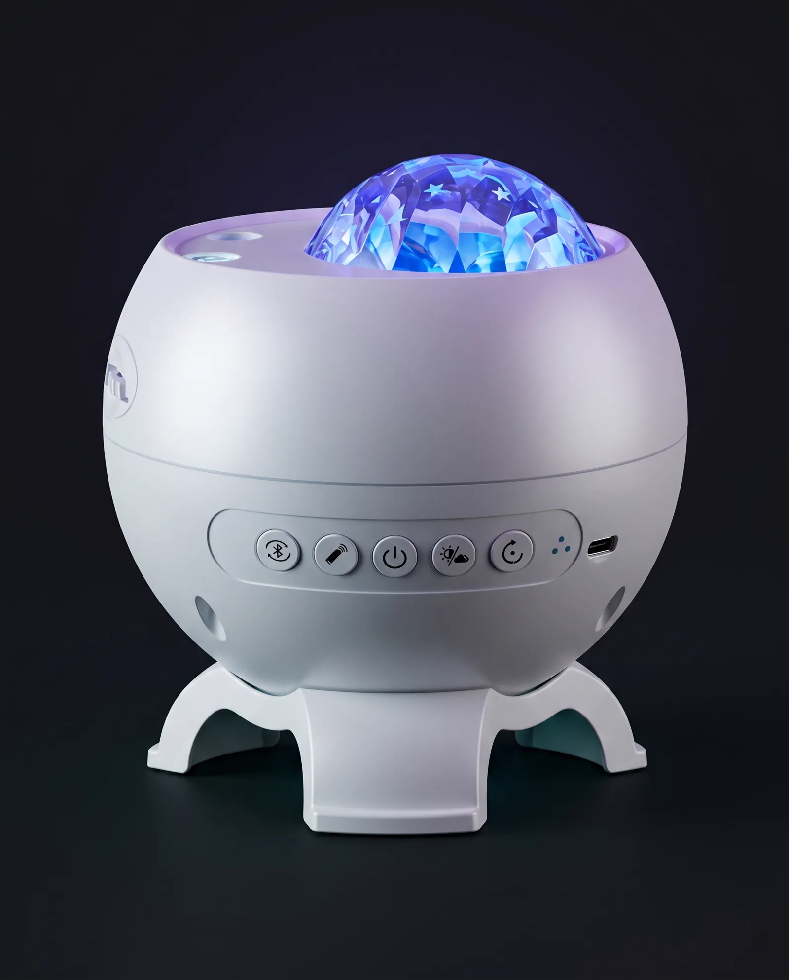 The aurora projector at three-quarter angle — controls, speaker, and crystal dome